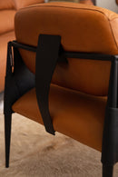 Poltrona Caroá confeccionada em 100% couro legítimo, com estrutura de madeira compensada e metal. Almofadas com espuma D30 e D26 soft e manta de fibra siliconizada, sistema Softpring e tecnologia Confortplus para conforto e durabilidade. Dimensões: Largura: 75 cm | Profundidade: 77 cm | Altura: 76 cm. Acompanha uma unidade. Outros itens mostrados na fotografia não estão incluídos.